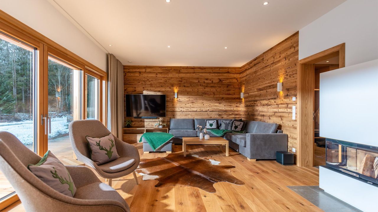 Wohnzimmer mit direkten Zugang zur Sonnenterrasse Wohnzimmer mit direkten Zugang zur Sonnenterrasse